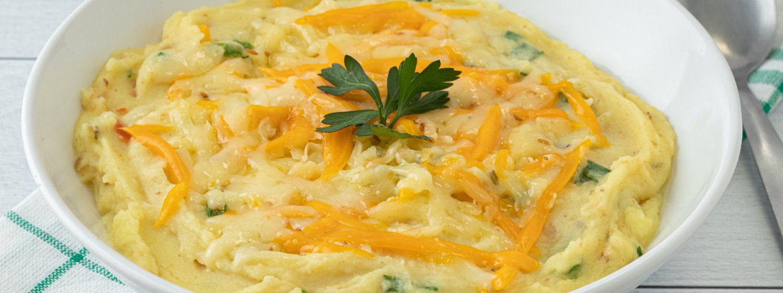 Purée de pommes de terre aux fromages