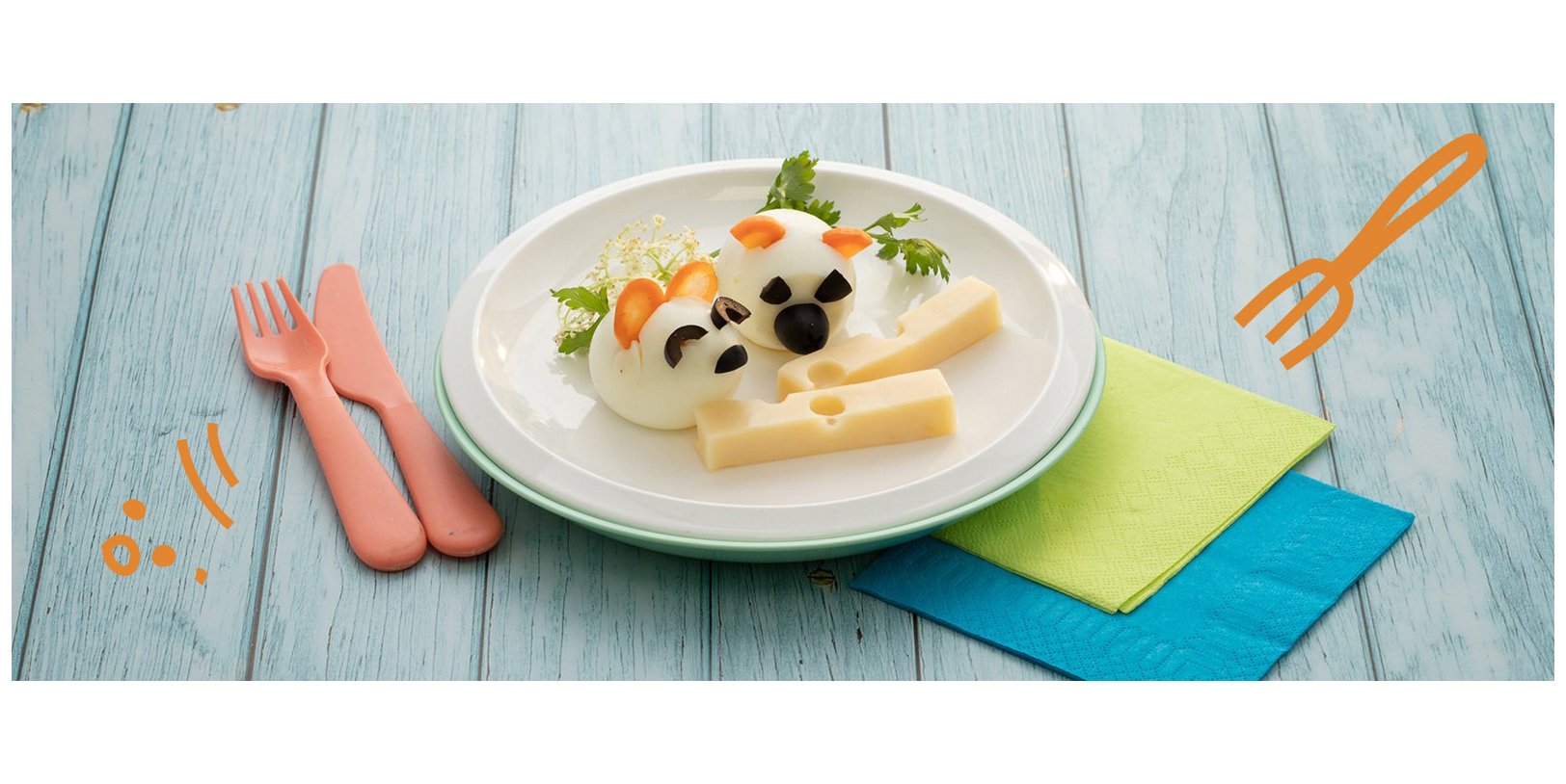Œufs durs rigolos et bâtonnets de fromage